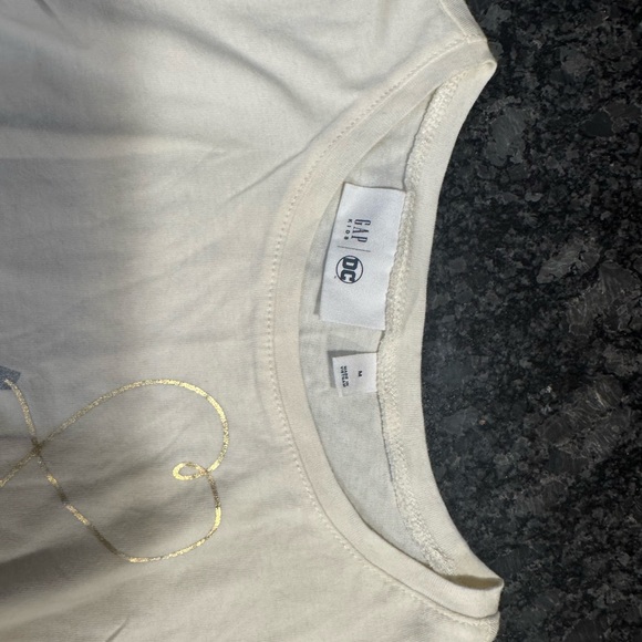 Like new GAP Cream Long Sleeve Shirt with Wonder Woman Design - Picture 3 of 4